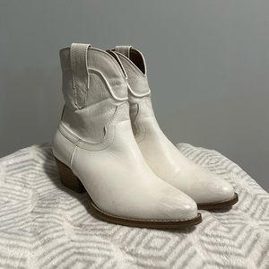 White leather zip ankle boots
